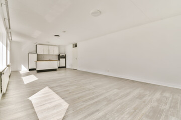 an empty living room with wood floors and white walls in the room is very clean, but there is no furniture