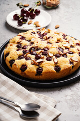Homemade cherry cake with almond nuts
