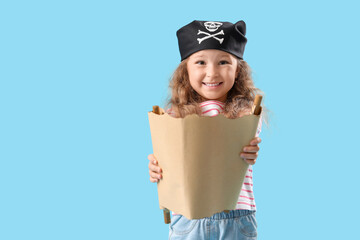 Cute little girl dressed as pirate with treasure map on blue background - Powered by Adobe
