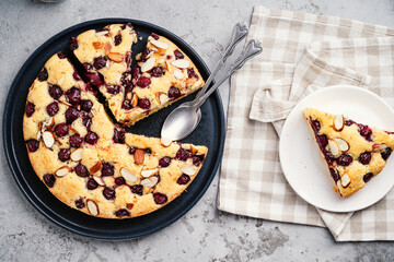 Homemade cherry cake with almond nuts