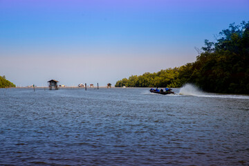 Landscape landmark of rural Thai fisherman lifestyle at dawn in Pranburi province, Thailand.