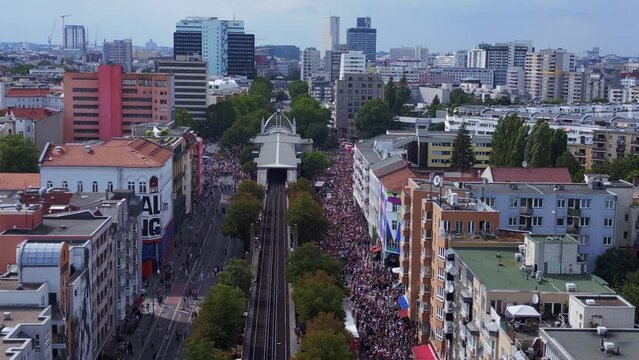 Beautiful aerial top view flight 
CSD Pride Love Parade 2023 in city Berlin Germany Summer day. panorama overview drone
4K Cinematic footage.