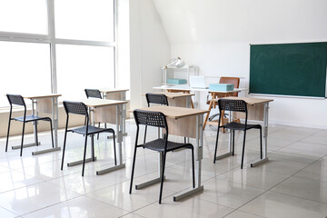 Obraz na płótnie Canvas Interior of stylish modern empty classroom