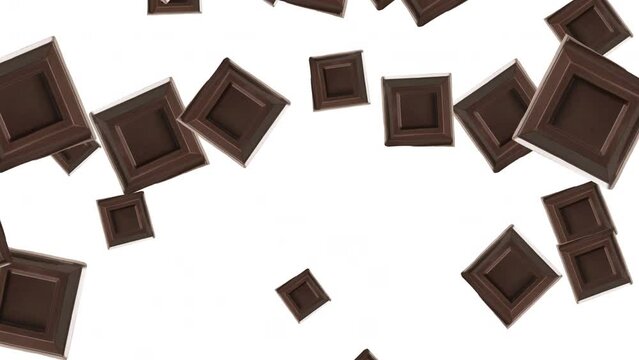 Pezzi di cioccolato fondente in caduta