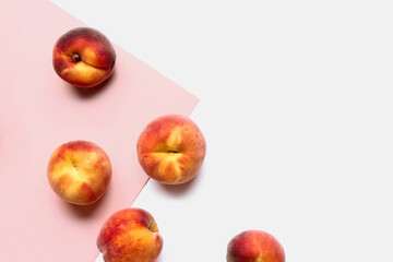 Sweet peaches on colorful background
