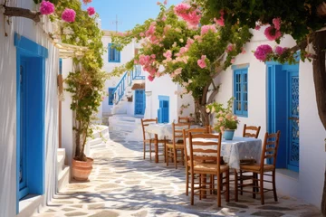 Fototapeten Greek culture with traditional white and blue greek architecture, taverna © Lubos Chlubny