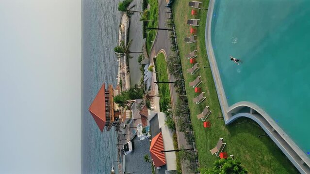 Aerial view of Hilton Garden Inn Hotel at La Romana in Dominican Republic, vertical format