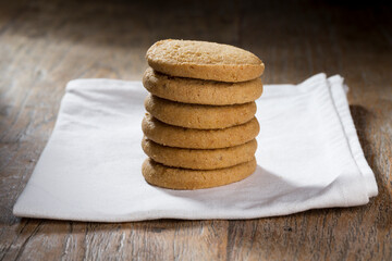 Stack of Biscuits on a rustic wooden table.