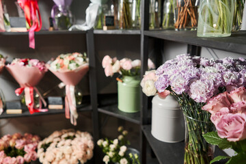 Ready-made bouquets for sale. Many different flowers on Showcase. Background of mix of flowers. Beautiful flowers for catalog or online store. Floral shop and delivery concept.