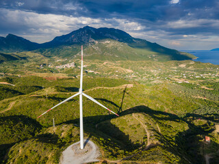 Aerial view of wind mill on a wind farm producing green energy zero emissions