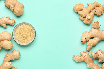 Fototapeta premium Fresh ginger roots and bowl with dried powder on turquoise background