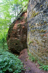 Sandstone cliffs at Krauklu aiza un ala (Raven's Ravine and Cave) in Gauja National Park, Sigulda,...