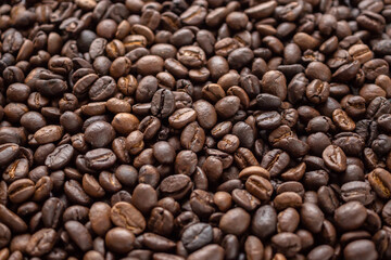 Fresh roasted brown coffee beans background