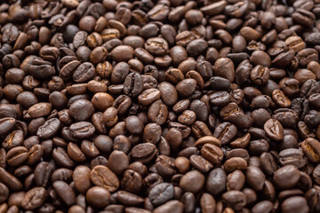Fototapeta premium Fresh roasted brown coffee beans background