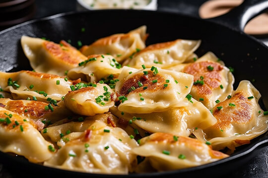 Polish fried dumplings pierogi topped with sourcream