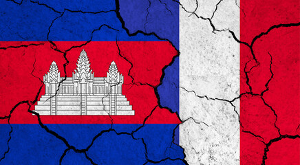 Flags of Cambodia and France on cracked surface - politics, relationship concept