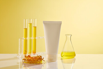 Front view of a white plastic tube unbranded decorated with cordyceps, test tube and erlenmeyer...