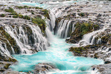 Bruarfoss waterfall in summer season in Iceland. Famous nature landscape background
