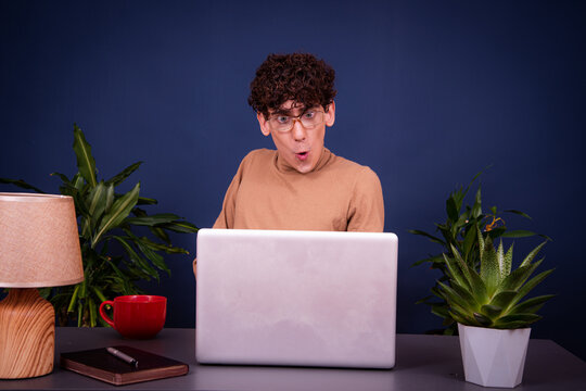 Funny silly guy communicates online, studies and solves issues at work.