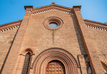 The façade of the church of Santa Croce (Holy Cross), built in the 15th century in Gothic style, in the town center of Fontanellato, province of Parma, Italy