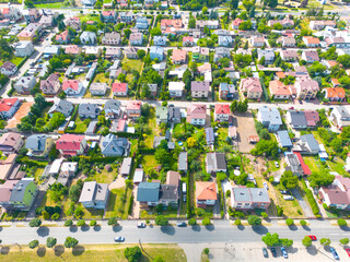 Aerial view of residential houses at spring.  neighborhood, suburb. Real estate, drone shots, sunset, sunlight, from above.