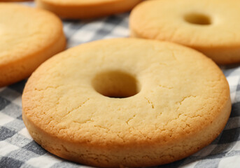 Sugar cookies on Textile napkin closeup MADE OF AI