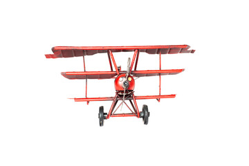 airplane toy red made of metal. White background