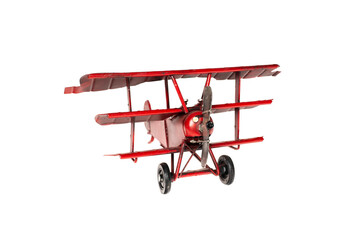airplane toy red made of metal. White background