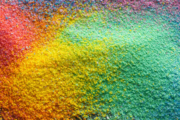 Close up of multi coloured sand and copy space background