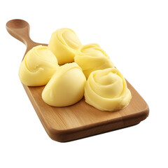 Butter curls or butter rolls on wooden spoon isolated.