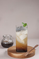 Ais Janda Pulang is Malaysian Young Coconut Meat with Gula Melaka Syrup, Summer Dessert. Es Degan or Es Kelapa Muda Gula Aren is Young Coconut with Palm Sugar Syrup in Indonesia