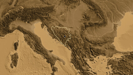 Shape of Bosnia and Herzegovina. Outlined. Sepia elevation.