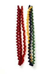 Twisted pipe cleaners in two tone twists, isolated on white, standing up like bar graphs, Generative AI