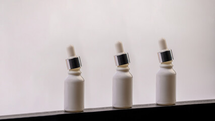 Cosmetic product in tube, bottle, lotion or serum on white background.
