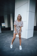 woman standing in front of a building