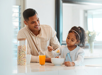Fototapeta na wymiar Happy, morning and a child with father for breakfast, food in a kitchen and care for nutrition at home. Smile, together and a young dad with a girl kid eating cereal in a house for health and hungry