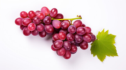 Fototapeta premium bunch of red grapes with green leaves on a white background, close-up. Generative Ai. 