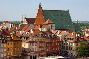Top view of historical buildings on Castle square (aka Plac Zamkowy) and archcathedral Basilica of the Martyrdom of St. John the Baptist in Warsaw Old Town, Poland
