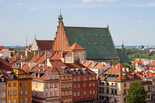 Aerial view of historical buildings on Castle square (aka Plac Zamkowy) and archcathedral Basilica of the Martyrdom of St. John the Baptist in Warsaw Old Town, Poland	
