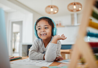 Video call, computer and child e learning, online class and home education, translation and listening on headphones. Happy kid or excited girl on laptop with audio streaming service or virtual school