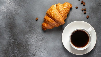 Coffee and croissant on stone table. French breakfast. Top view flat lay with copy space for your text