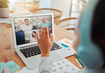 Video call, laptop and child greeting her family while sitting by the dining room table in her home. Technology, waving and girl kid on a virtual call with her parents and grandfather on a computer.