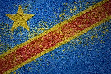 Fototapeta na wymiar painted big national flag of democratic republic of the congo on a massive old cracked wall