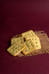 Crunchy  biscuit for healthy life with wheat and cup of tea for breakfast.