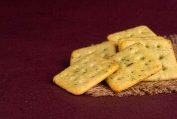 Crunchy  biscuit for healthy life with wheat and cup of tea for breakfast.