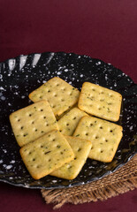 Crunchy  biscuit for healthy life with wheat and cup of tea for breakfast.