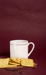 Crunchy  biscuit for healthy life with wheat and cup of tea for breakfast.