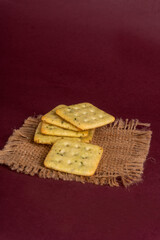 Crunchy  biscuit for healthy life with wheat and cup of tea for breakfast.