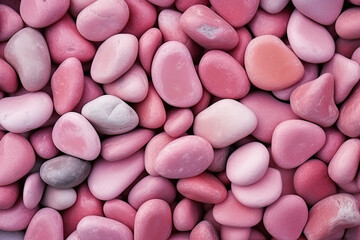 Obraz na płótnie Canvas Pebbles stones background with pink toned