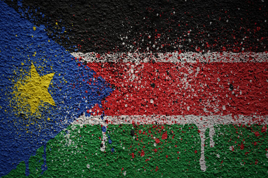 painted big national flag of south sudan on a massive old cracked wall